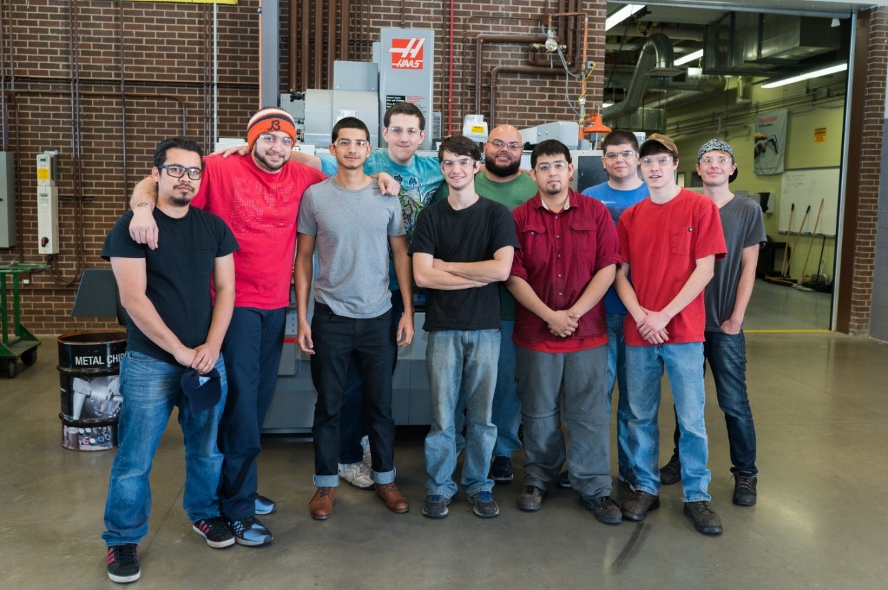 Registered Apprentices in CNC Precision Machining and Industrial Maintenance Mechanic programs at Harper College in the manufacturing labs